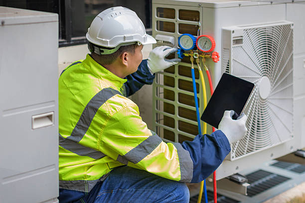 Professional Air Duct Cleaning technician working in Joaquin, TX